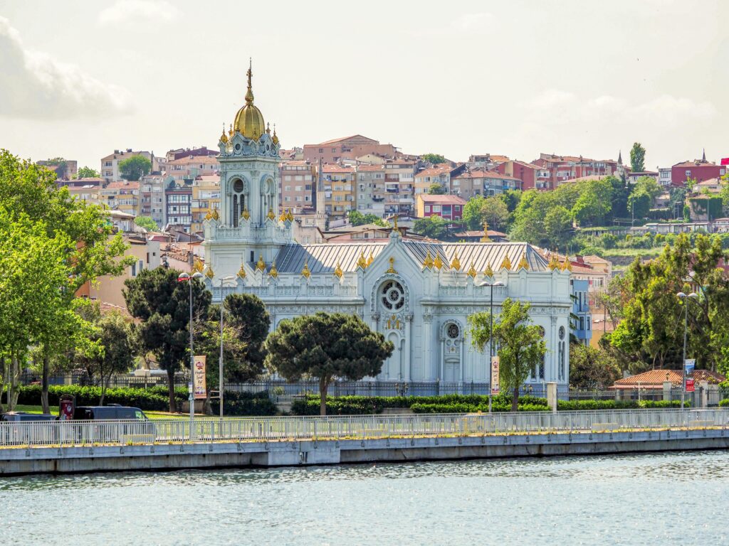 Beautiful view of St. Stephen Church with waterfront in Istanbul, Turkey, showcasing historic architecture.