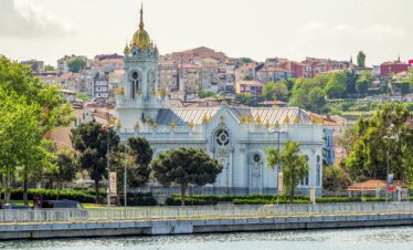 Beautiful view of St. Stephen Church with waterfront in Istanbul, Turkey, showcasing historic architecture.