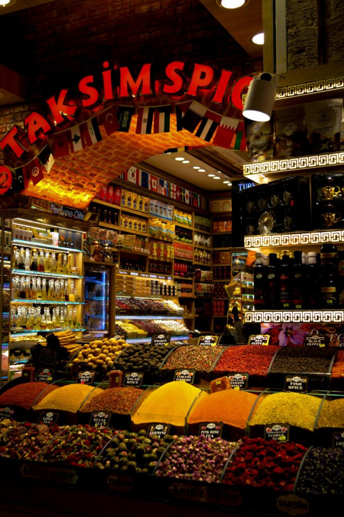 Vibrant display of spices and merchandise at Taksim Spice Market, Istanbul.