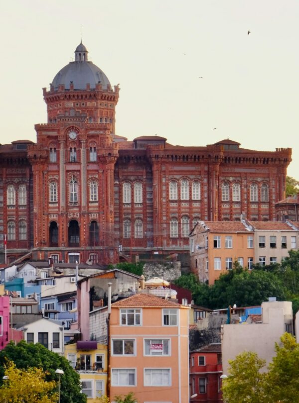 Vibrant view of Fener Greek Patriarchate and colorful houses in Istanbul, Turkey.