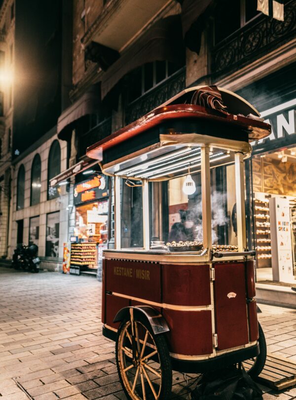 Retro food cart for preparing and selling goods on paved street in Turkey
