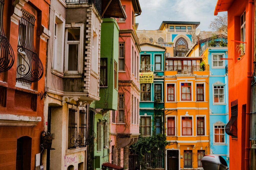 Vibrant multi-colored buildings showcasing unique architecture in Balat, İstanbul.