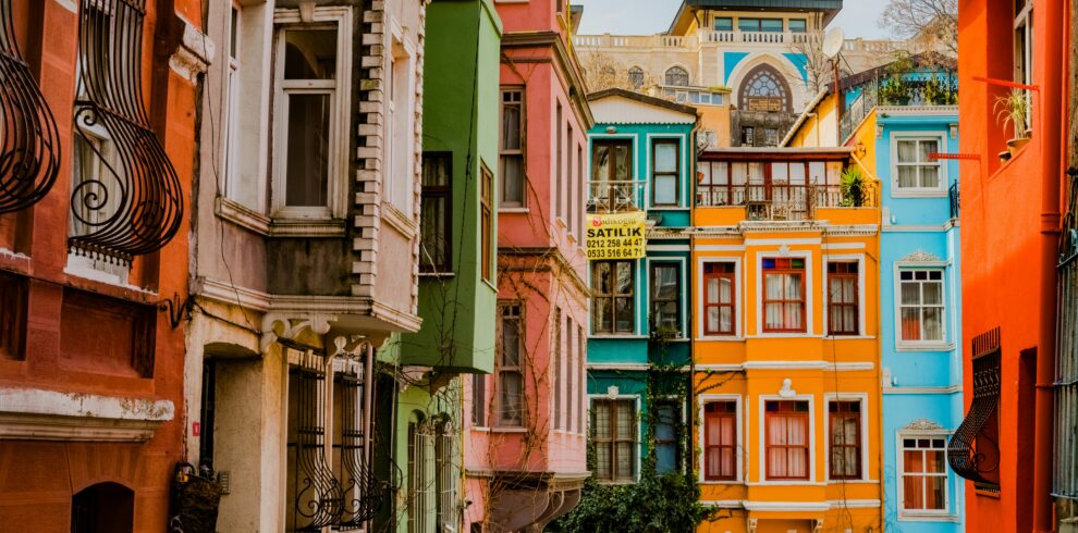 Vibrant multi-colored buildings showcasing unique architecture in Balat, İstanbul.